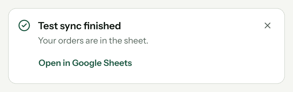 A message in SuperJack saying Test sync finished, Your orders are in the sheet, with an Open in Google Sheets link